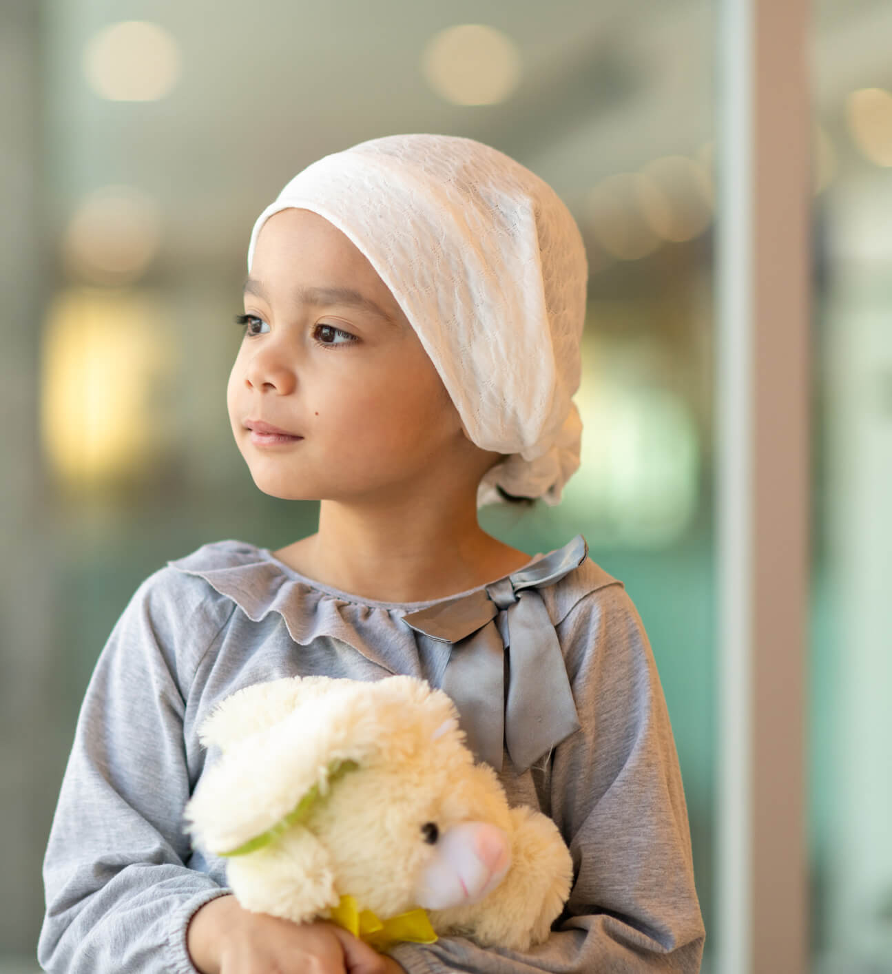 Little girl looking at outside